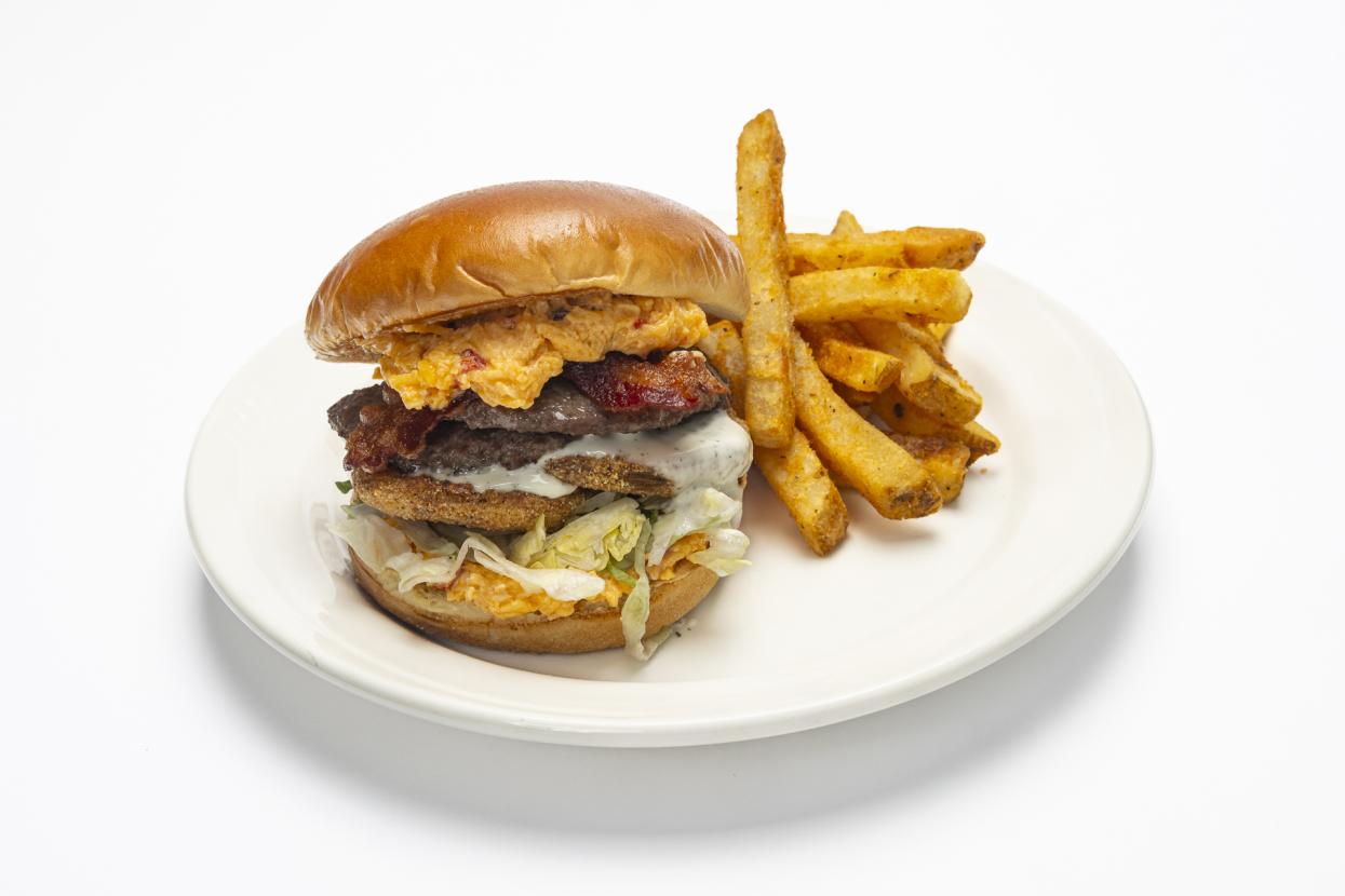 Burger and fries on a white plate